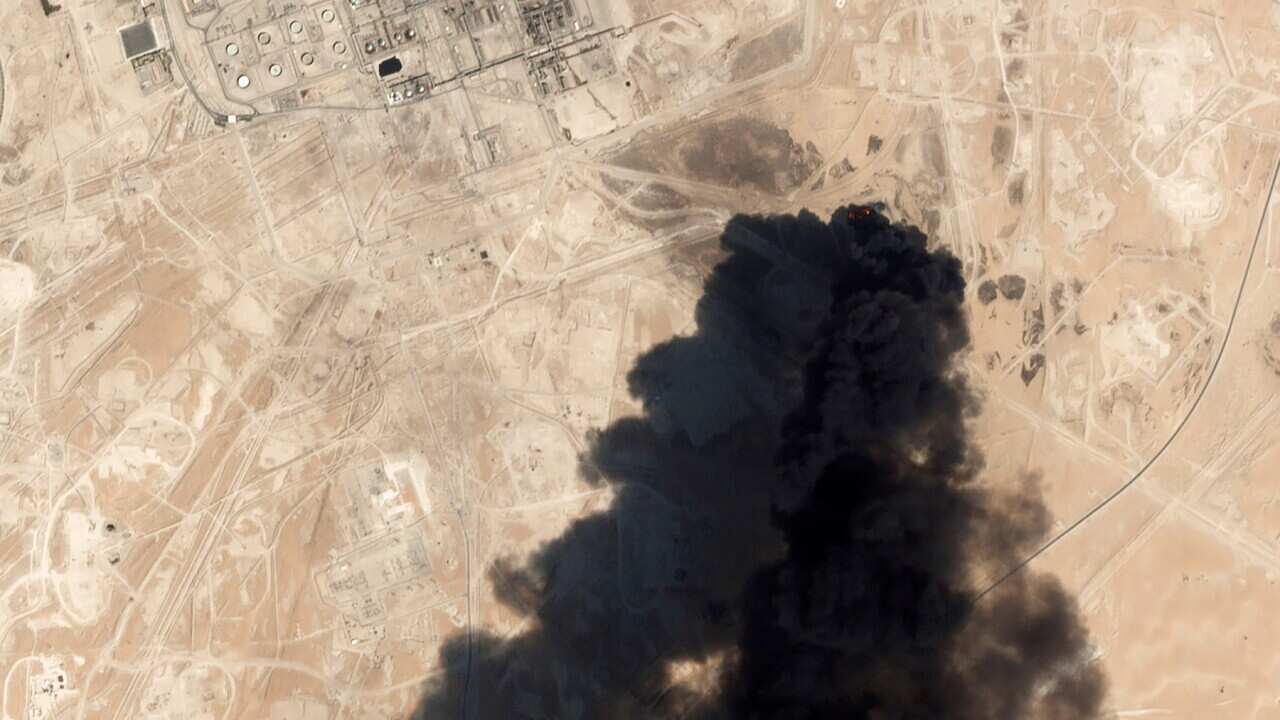 Sept. 14, 2019, satellite shows thick black smoke rising from Saudi Aramco's Abqaiq oil processing facility in Buqyaq, Saudi Arabia.(Planet Labs Inc via AP)