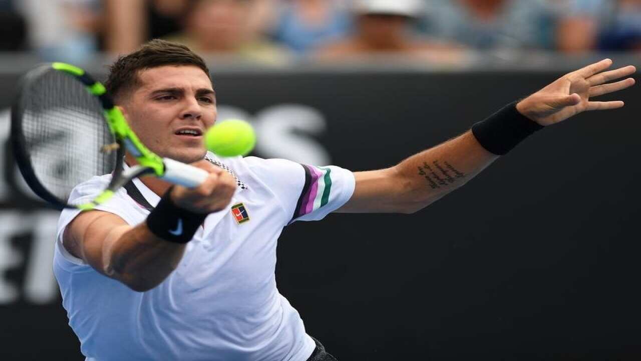 Thanasi Kokkinakis of Australia in action against Taro Daniel.