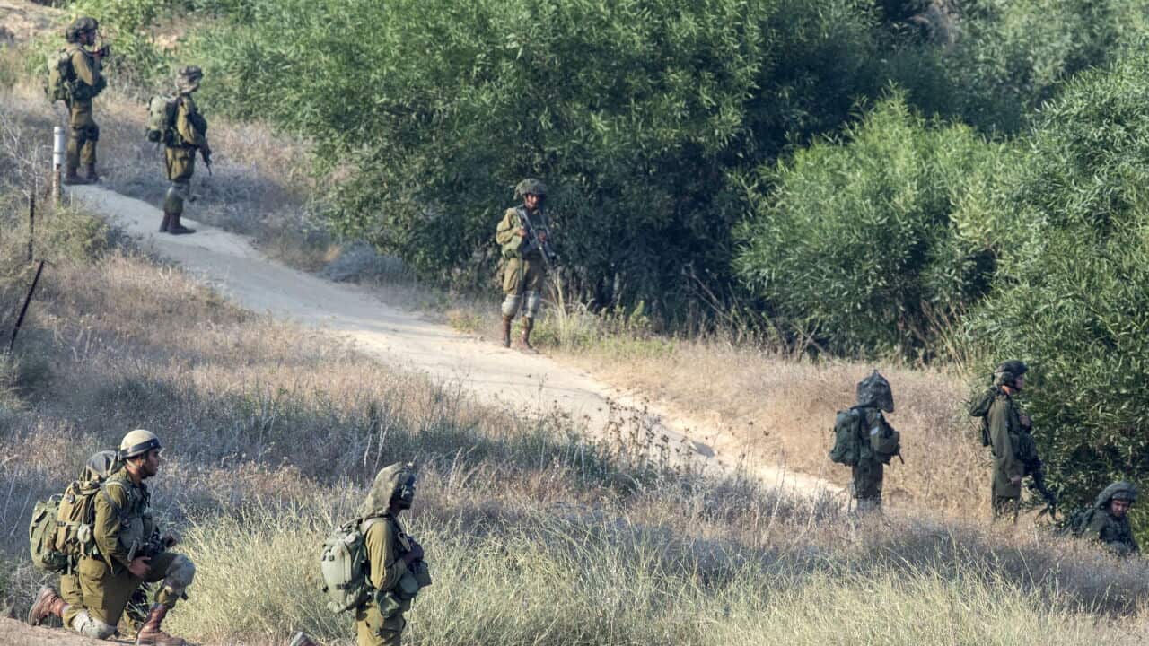 Israeli soldiers hold positions near the Israeli-Gaza border on July 21, 2014, after militants from Gaza infiltrated southern Israel through two tunnels. (AFP/Getty)