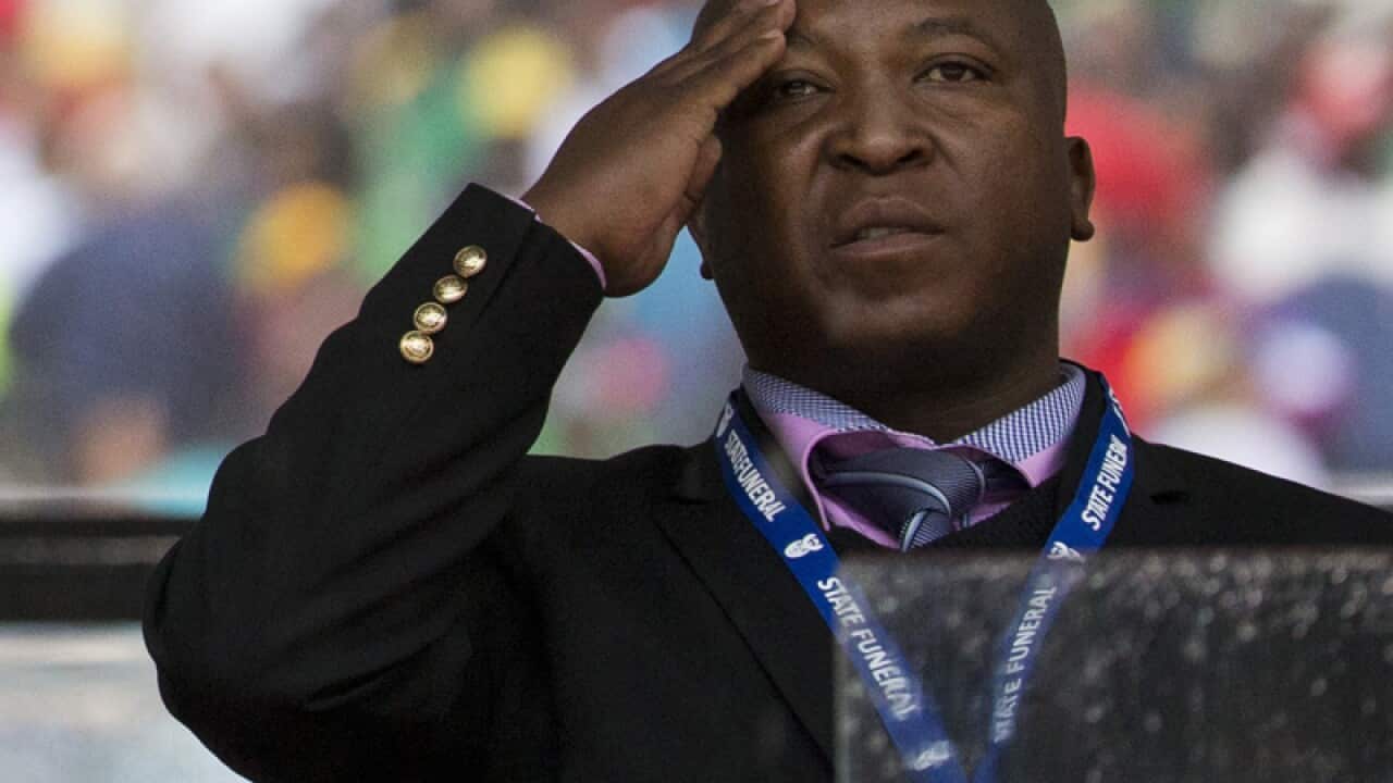 Thamsanqa Jantjie (R) at a funeral for Nelson Mandela