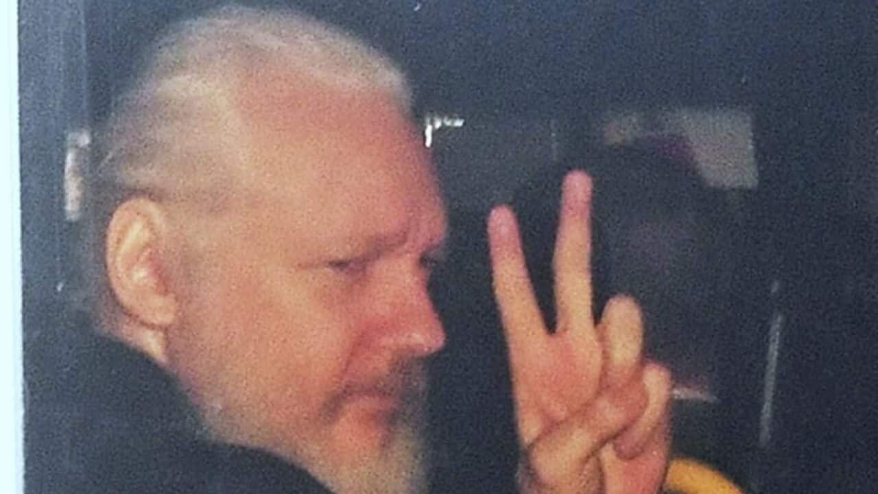 Julian Assange after his arrest in London