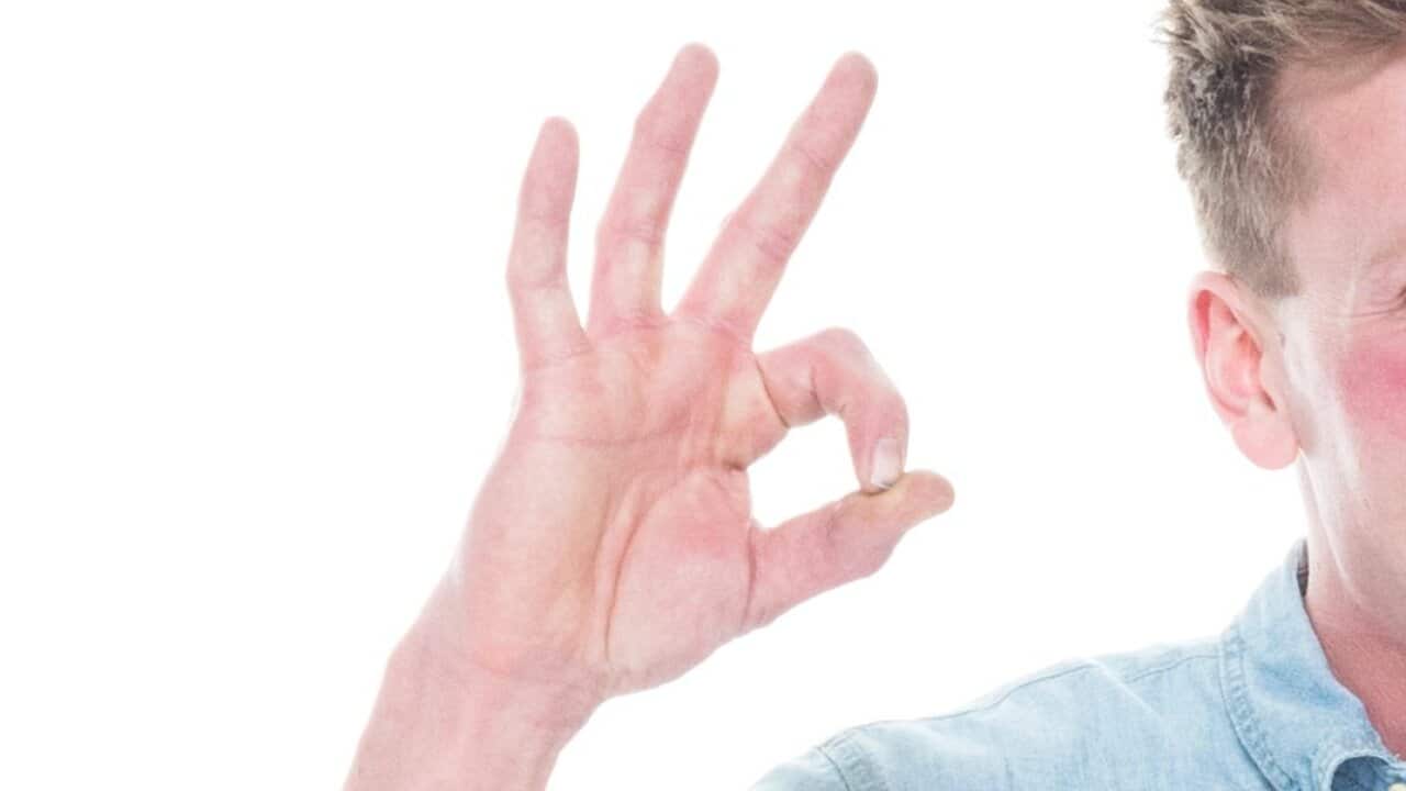 Man doing okay sign