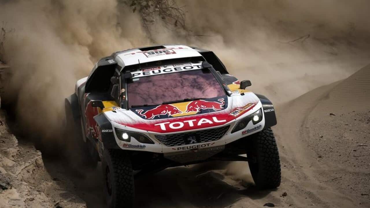 French Stephane Peterhansel and Jean Paul Cottret of Peugeot