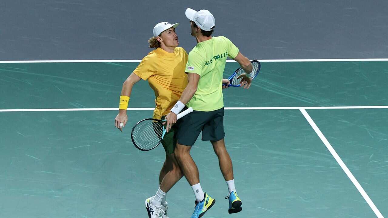 Matthew Ebden (R) and Max Purcell (L) of Australia celebrate the victory at the 2023 Davis Cup quarterfinals against Czech Republic