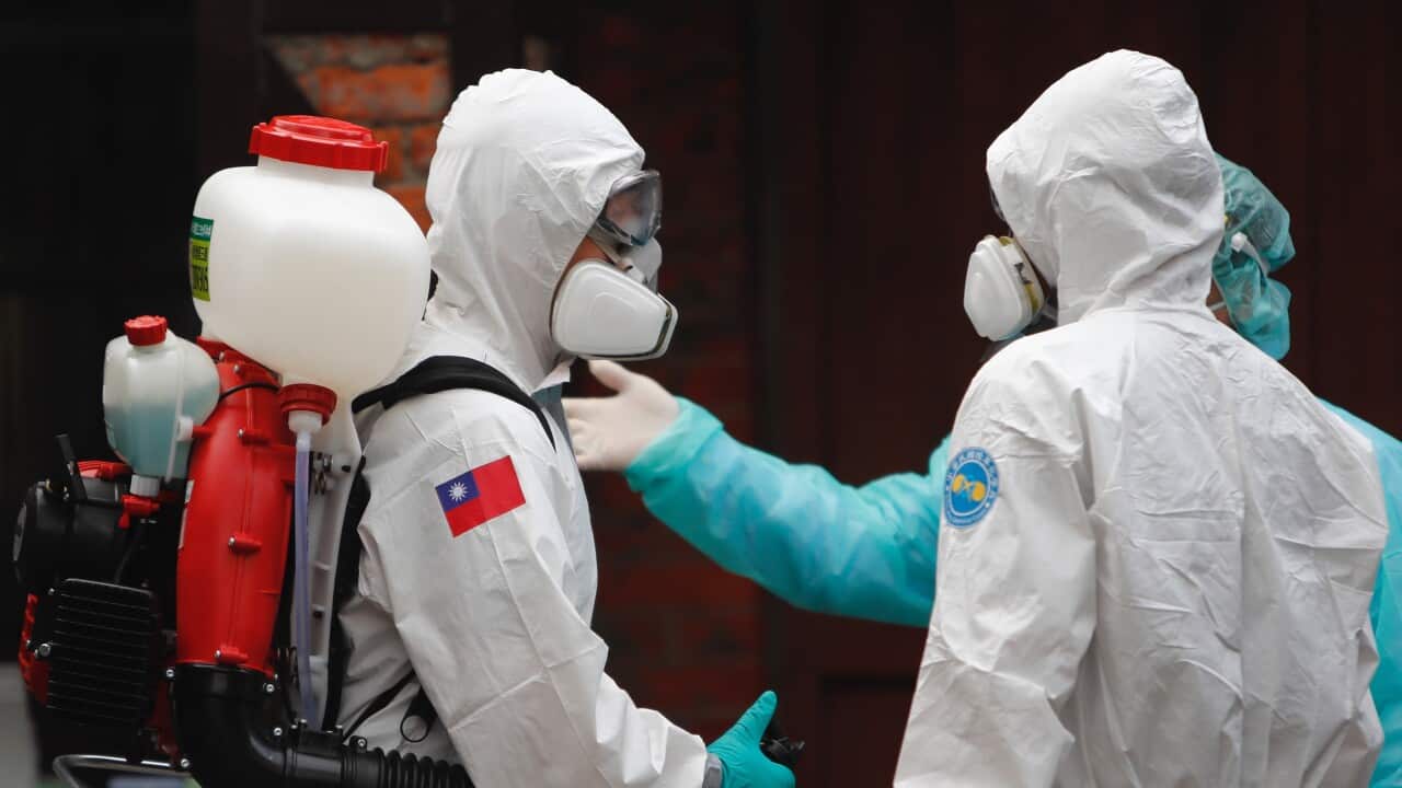 Military officers sanitise COVID-19 testing centers and workers as Taiwan raised its coronavirus alert levels. Taipei, Taiwan, 16 May 2021.