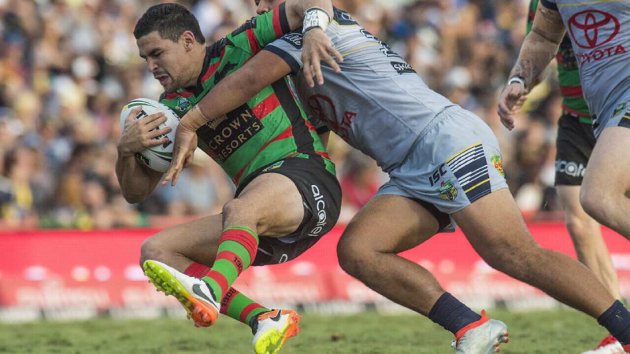 Adam Reynolds of the Rabbitohs is hauled down