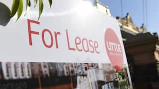 A sign out the front of property that reads "For Lease".