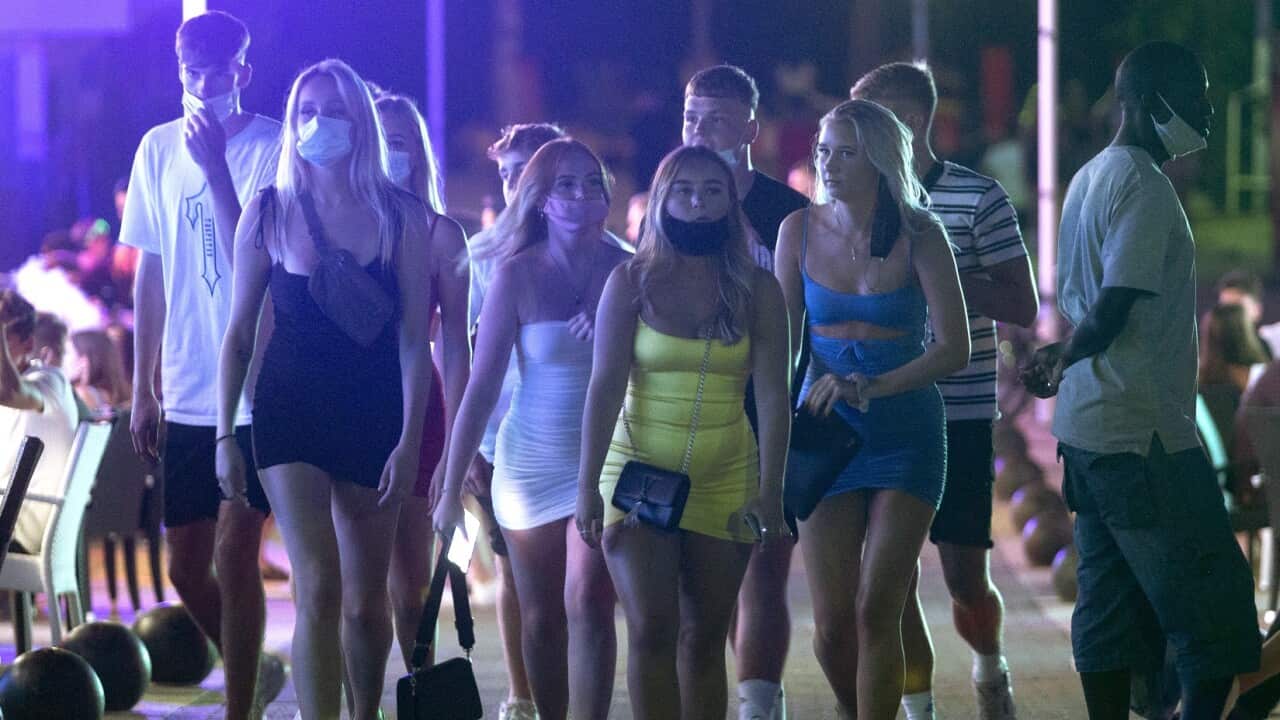 Young tourists at the resort of Magaluf on the Spanish Balearic island of Mallorca, Spain.