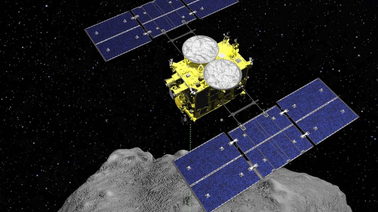 Japan's Hayabusa2 spacecraft above the asteroid Ryugu
