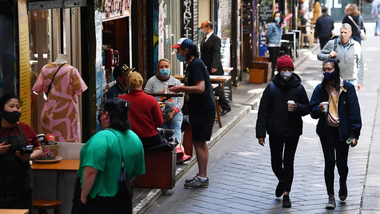 People are seen in Centre Place in Melbourne