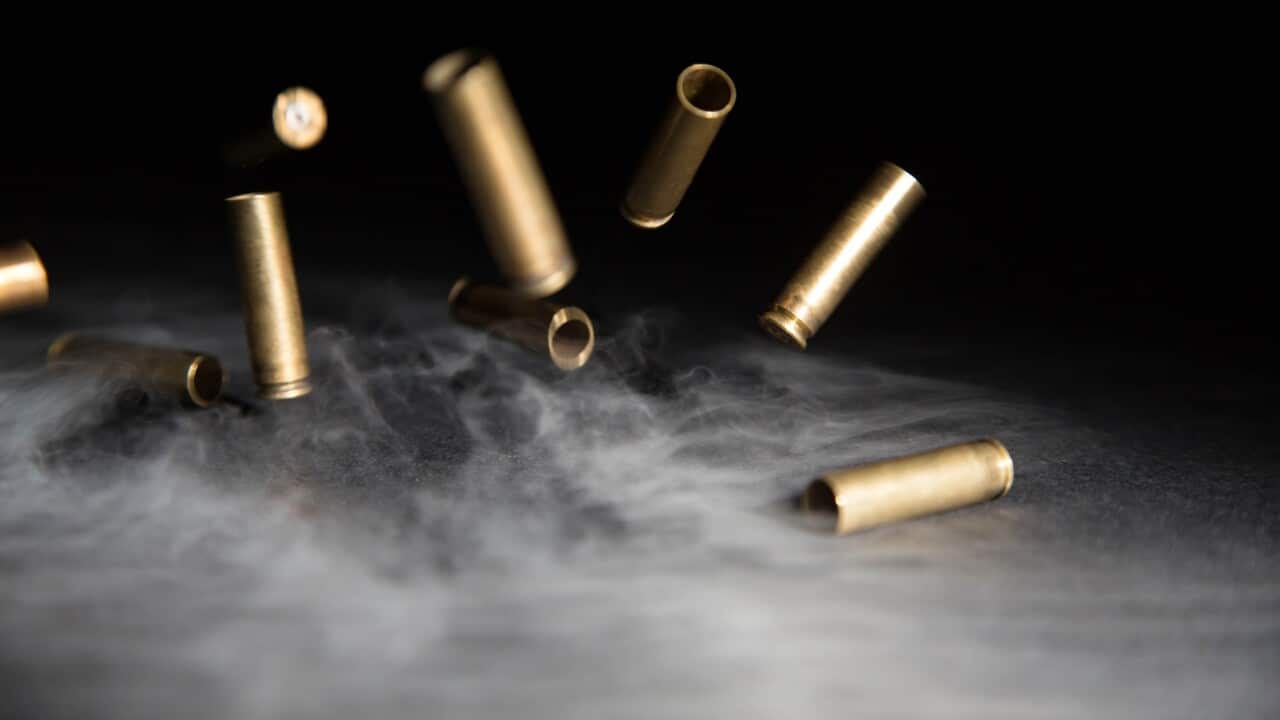 Smoking Bullets Falling on Ground