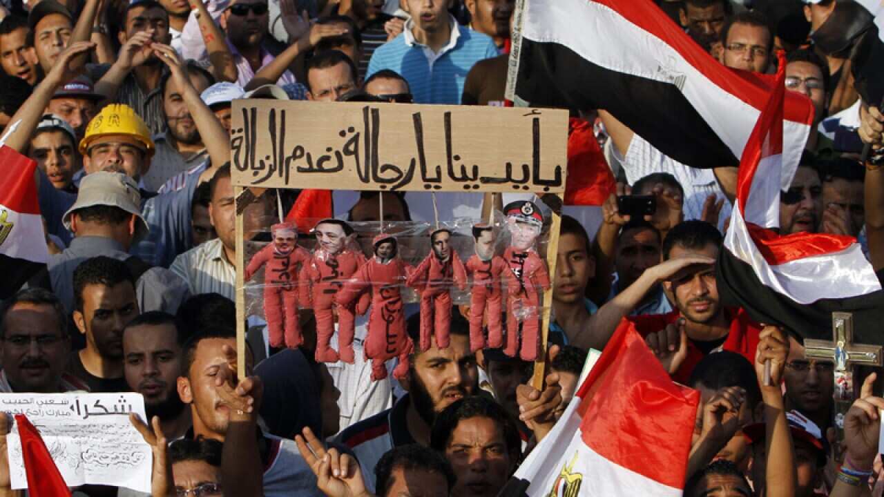 June 2: A court in Cairo sentences the ousted Egyptian leader, Hosni Mubarak, to life in jail for ordering the deaths of protesters during the 'Arab spring' revolt of 2011. Protesters hold a banner depicting Mubarak and his aides being hanged in Tahrir Sq