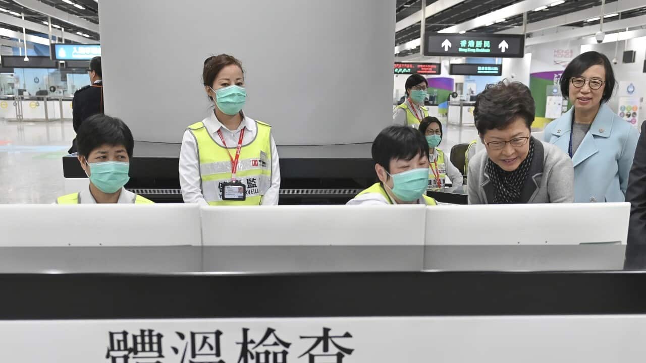 Hong Kong's Carrie Lam inspects health measures after fears a mysterious infectious disease that may have been brought back by visitors to a mainland Chinese city.