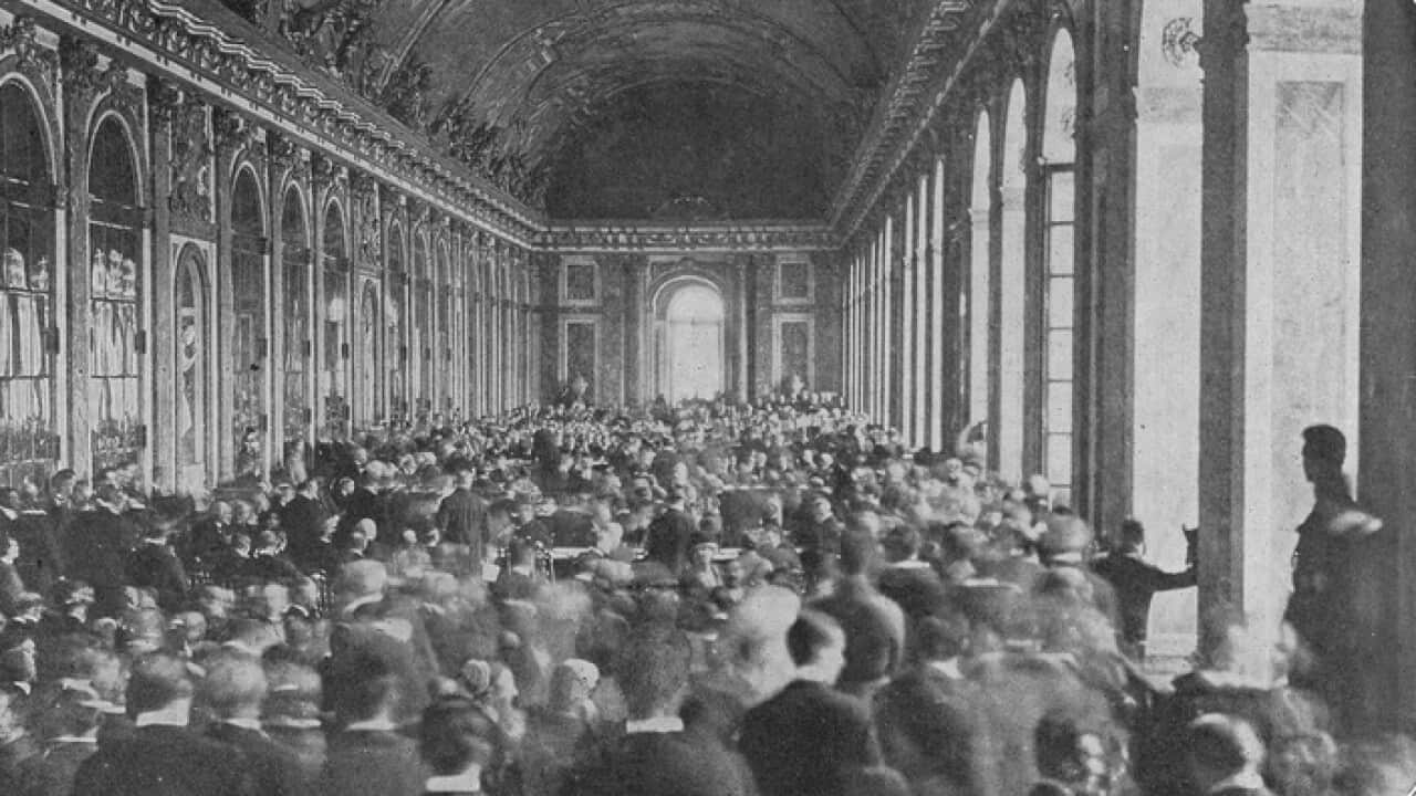 Dignitaries gathered in the Hall of Mirrors