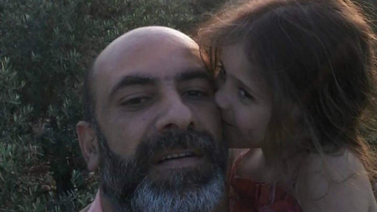 George Zreik with his daughter