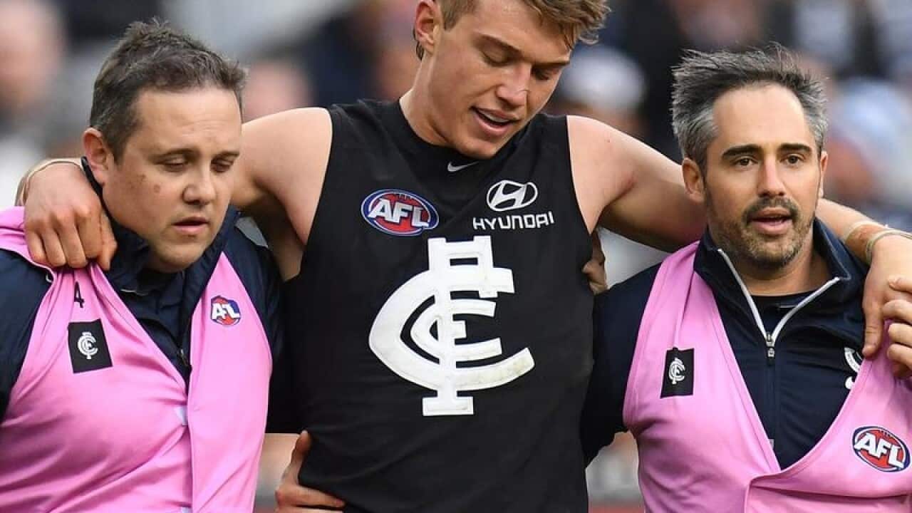 Patrick Cripps of the Blues after sustaining an injury
