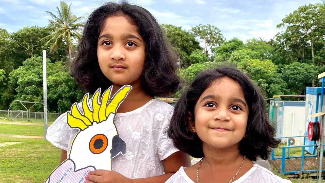 Kopika, six, and Tharnicaa, three, on Christmas Island where they have been detained since August 2019.