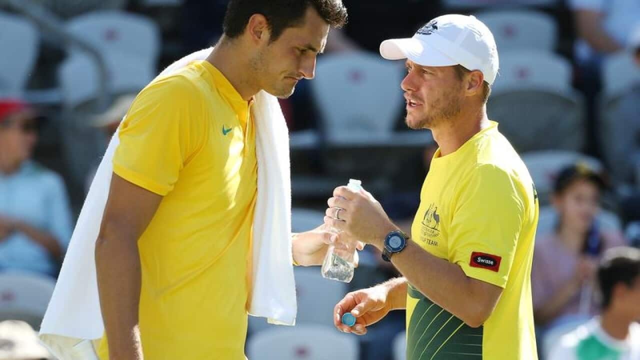 Bernard Tomic and Lleyton Hewitt.