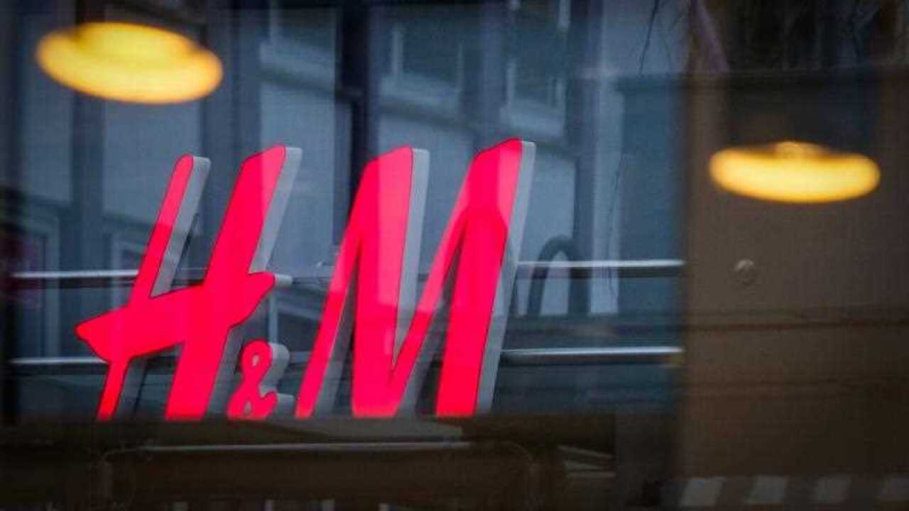 A logo of Swedish clothing company "H&M" (Hennes & Mauritz) is seen on a store.