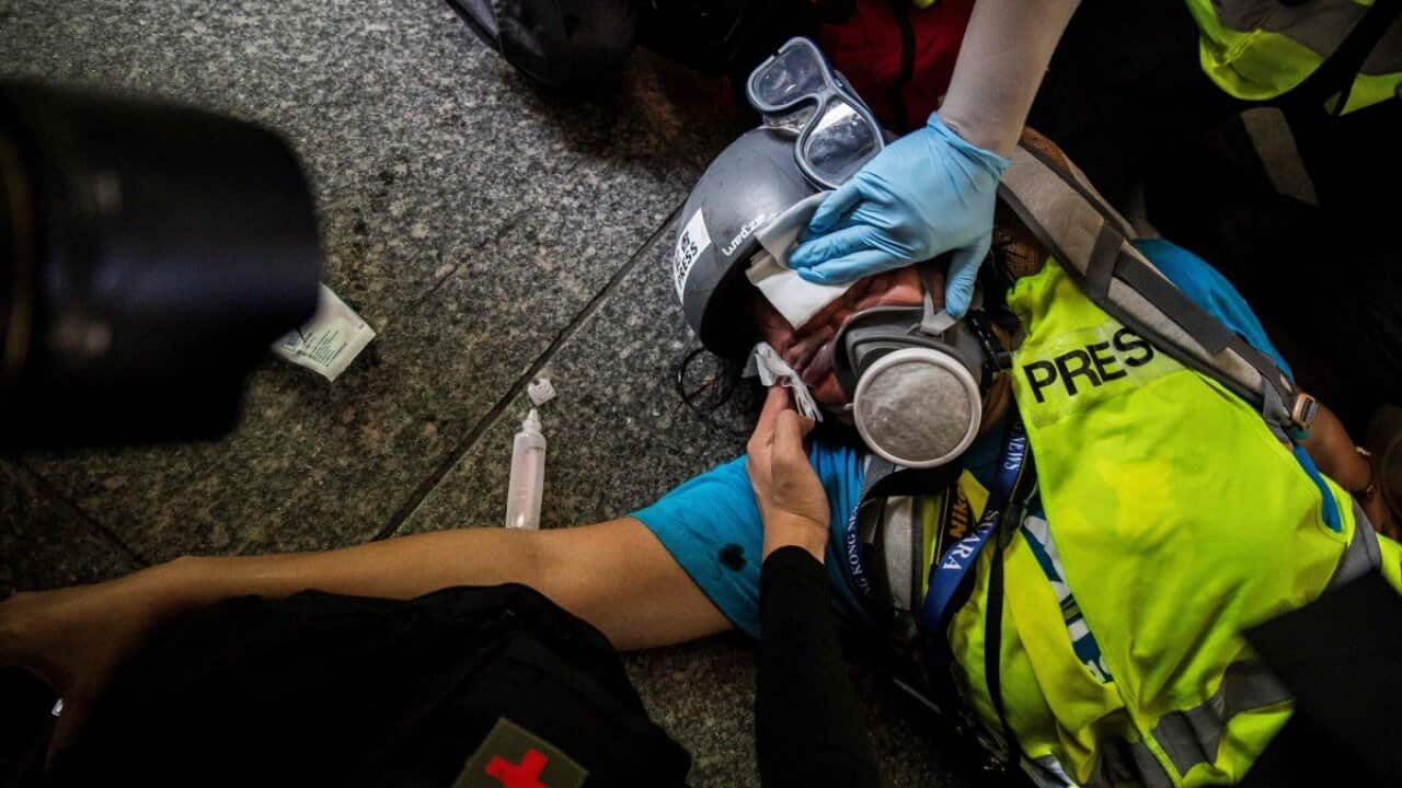 Journalist left blind by rubber bullet in Hong Kong