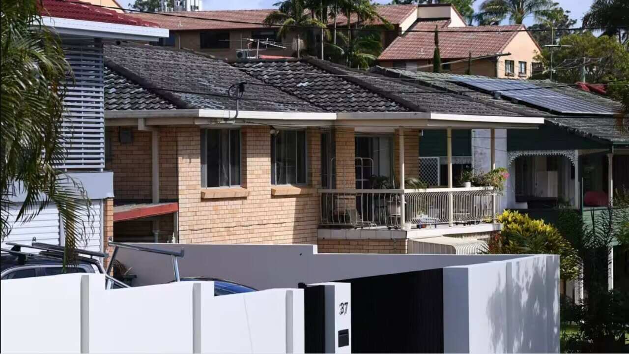 Houses are seen in Brisbane, Friday, February 10, 2023. Queensland housing advocates are calling for the state government to put limits on the amount and size of rent rises allowed each year. Source: AAP / JONO SEARLE/AAPIMAGE