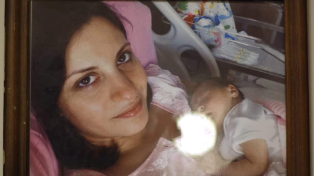 Kübra Eken with her daughter after giving birth