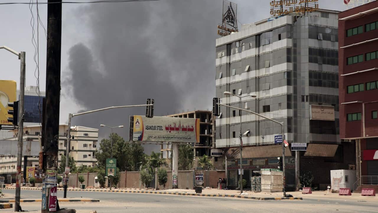 Smoke is seen rising from a neighbourhood in Khartoum, Sudan on 15 April 2023.