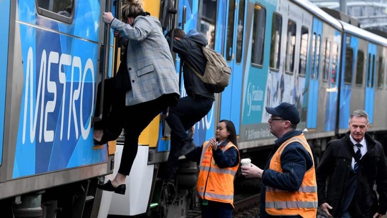 Passengers on a Metro train