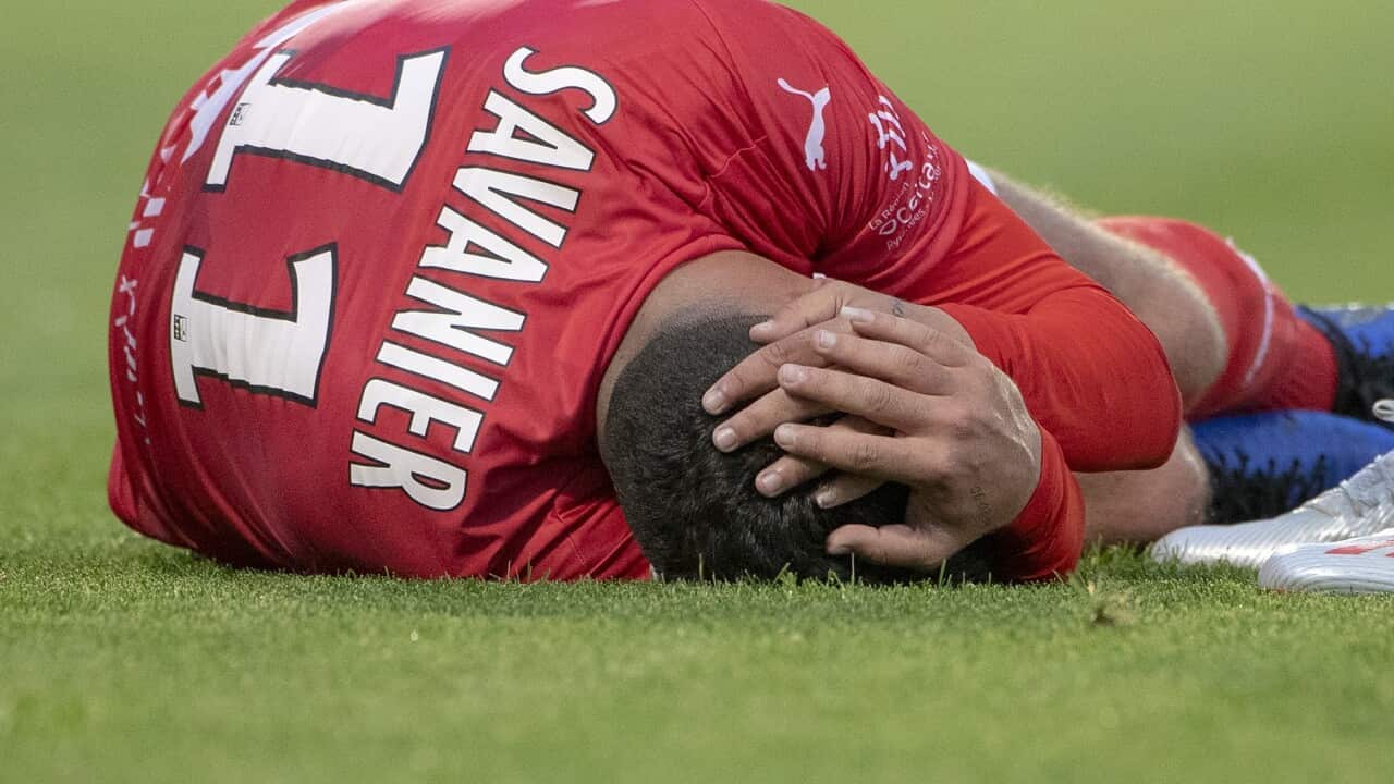 French football player Teji Savanier from Nimes after taking a knock to the head in a match