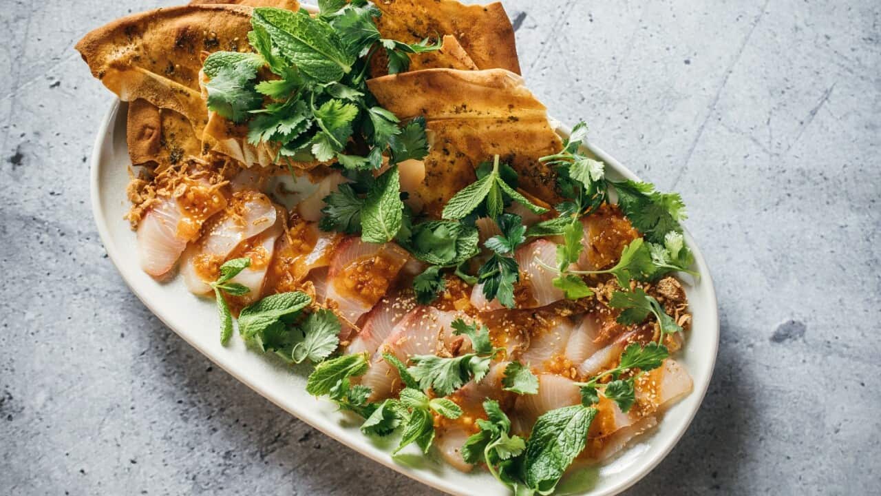 Kingfish sashimi with preserved lemon and harissa dressing