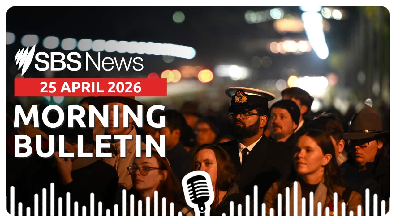 People attend the Anzac Day dawn service at the Australian War Memorial in Canberra.
