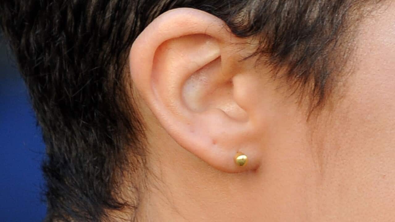Close-up of woman's ear.
