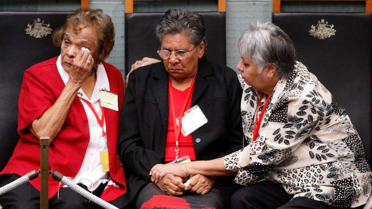 Stolen Generations members listen to Prime Minister Kevin Rudd deliver the Apology in 2008