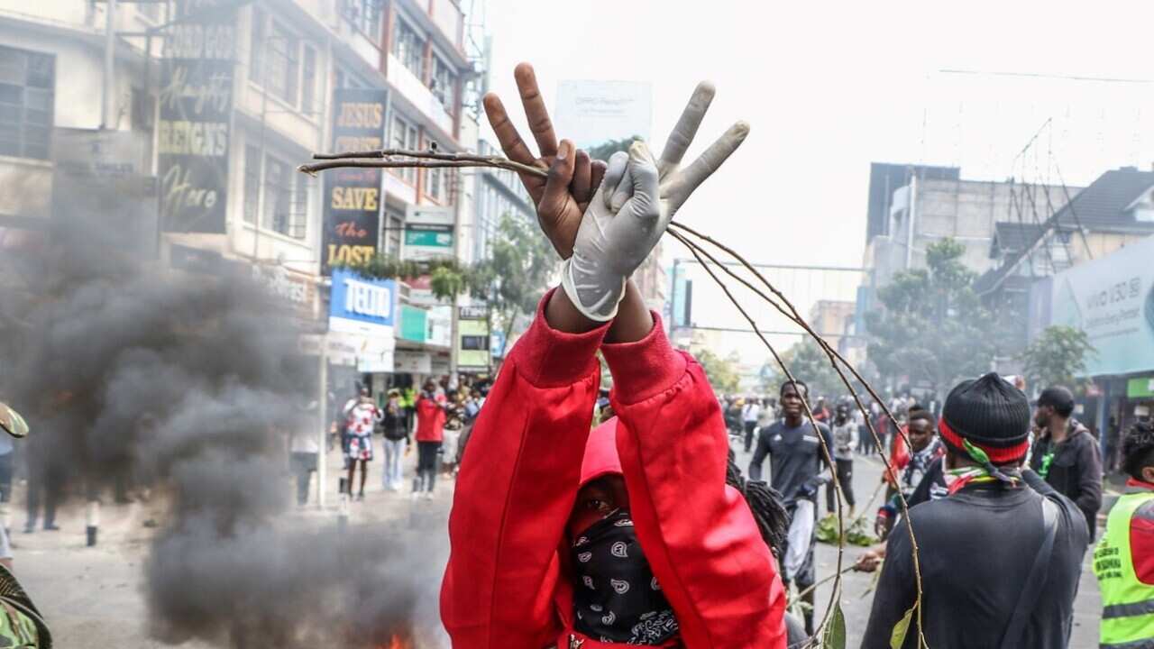 A protester against the tax bill in the Kenyan city of Nakuru (AAP).jpg