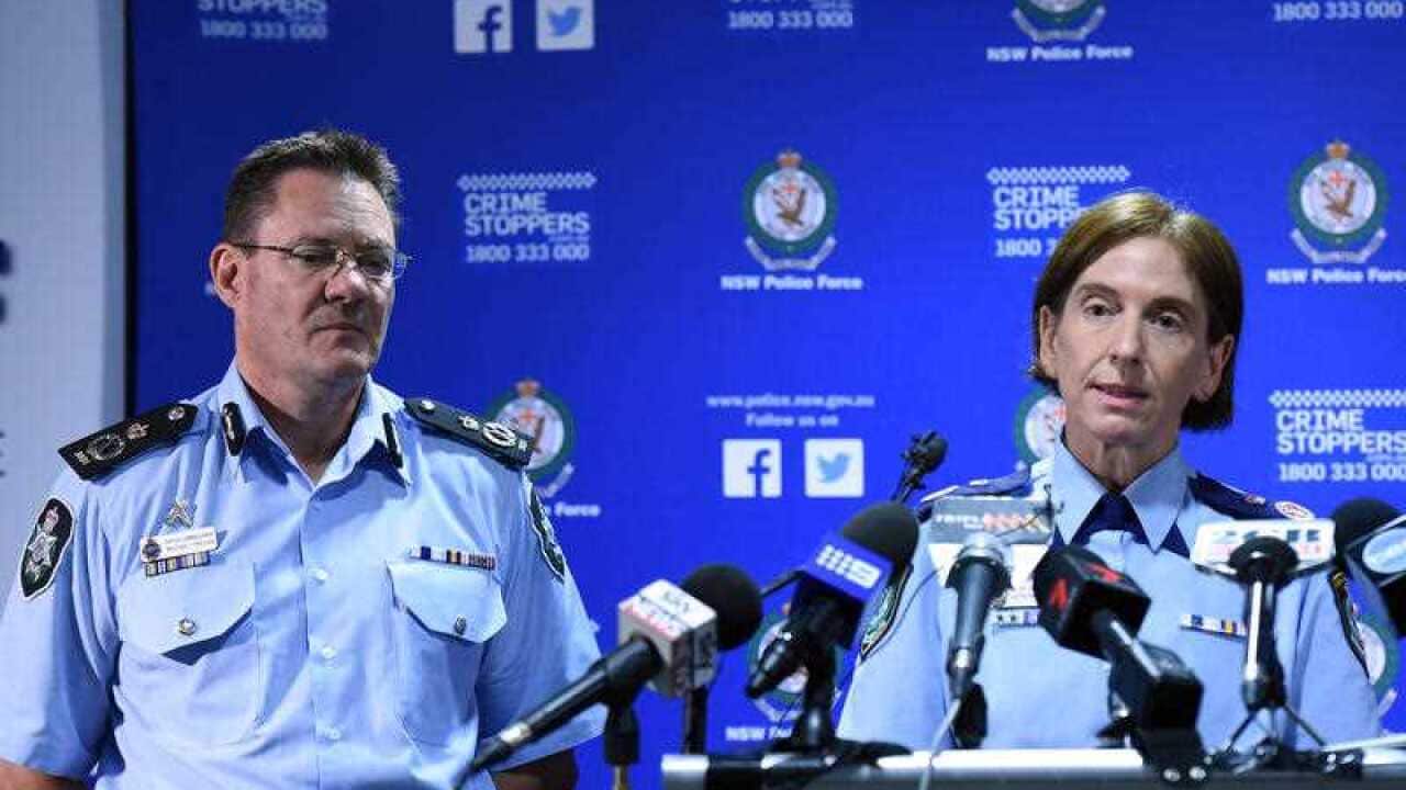 AFP Deputy Commissioner National Security Michael Phelan and NSW Police Deputy Commissioner Catherine Burn speak to the media.