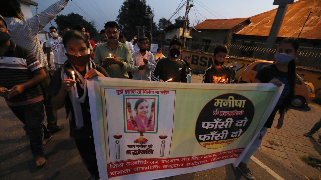 Balmiki people take part in a vigil and protest to seek justice for the victim of alleged gang rape in Uttar Pradesh state, in Dharamsala, India