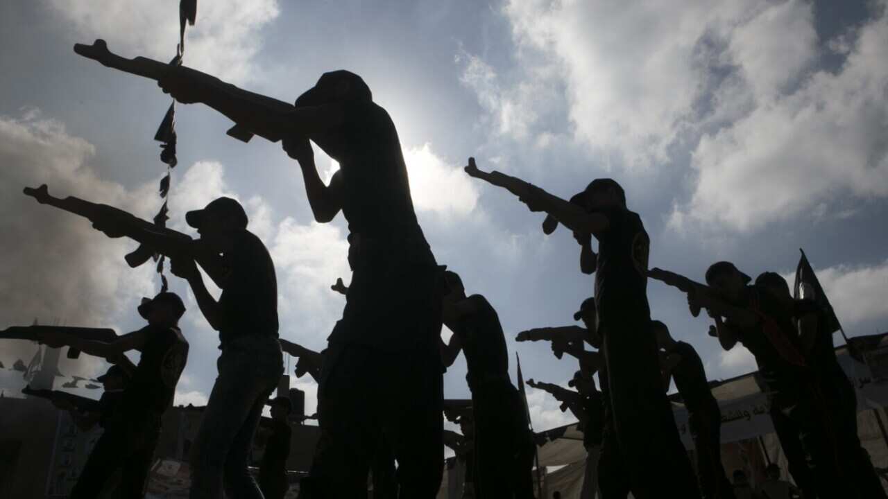 Mlitary-style exercise at a summer camp organised by the Islamic Jihad movement (AAP)