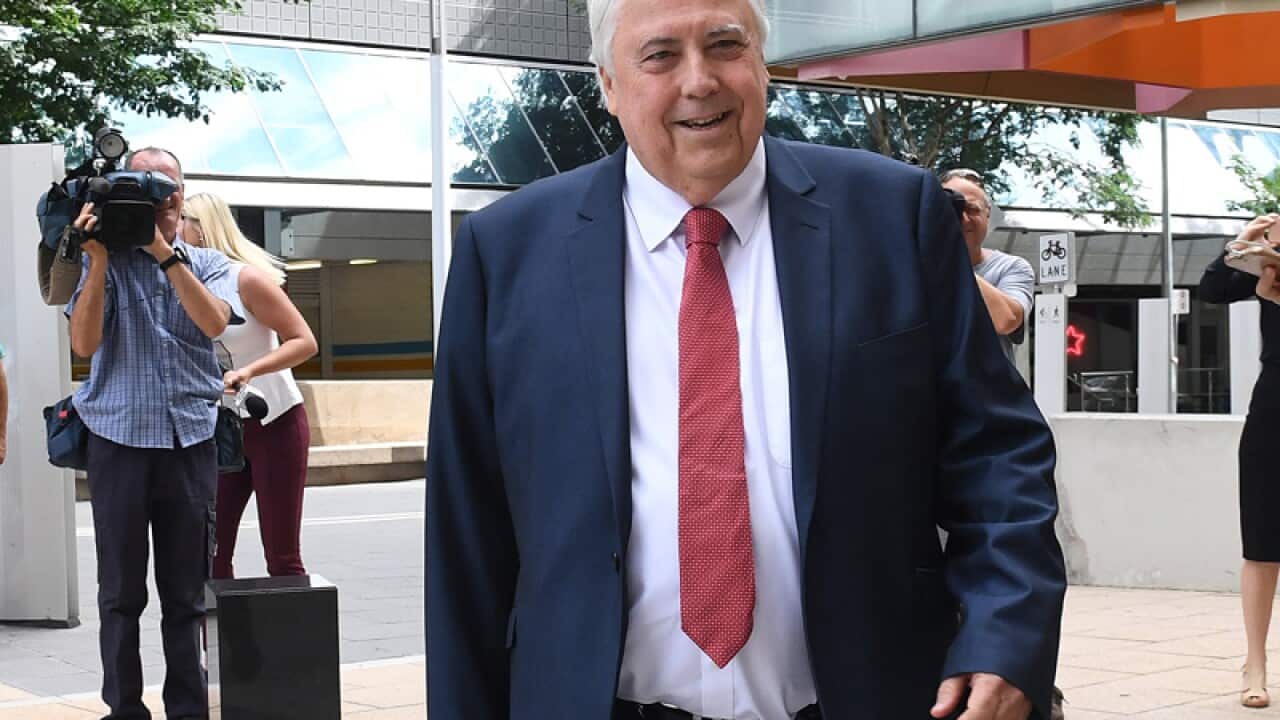 Clive Palmer is seen on arrival to the Federal Court in Brisbane