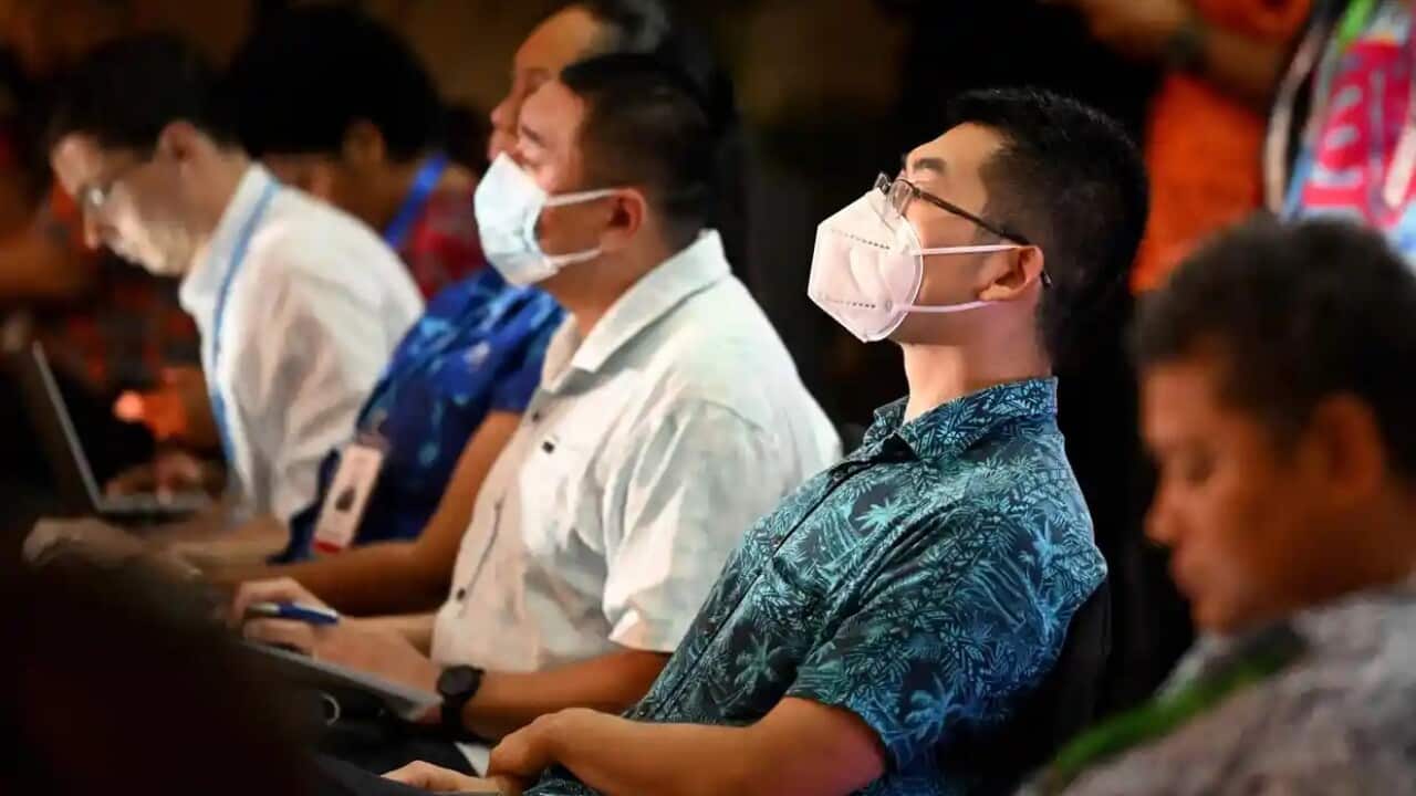 Two Chinese officials listen to US vice-president Kamala Harris’s virtual address at the Pacific Islands Forum in Fiji before being asked to leave the meeting.
