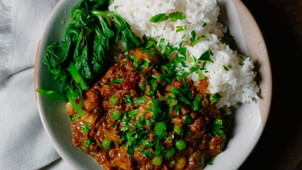 Bully beef curry with steamed greens
