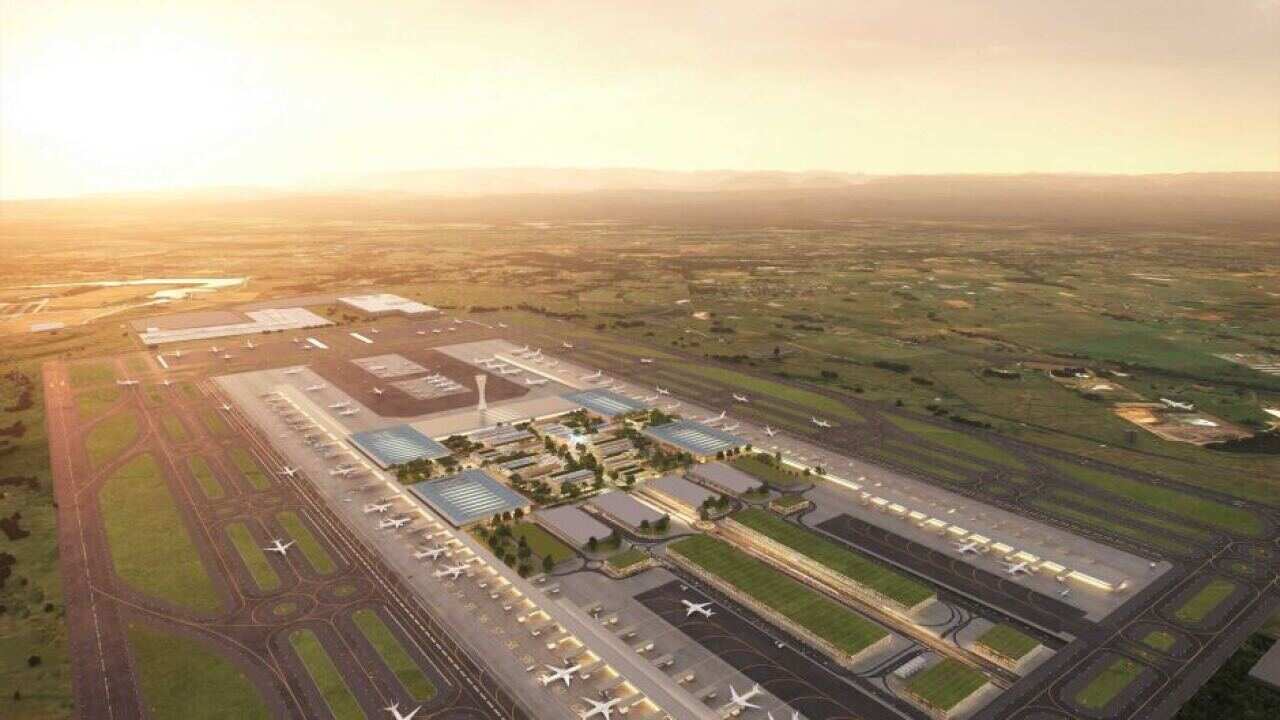 The airport is set to open in 2026.
