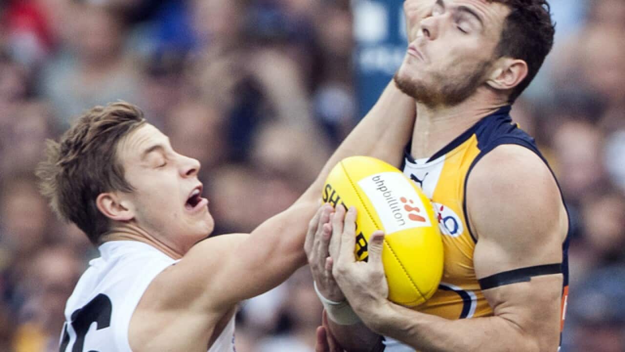 West Coast's Luke Shuey (R)