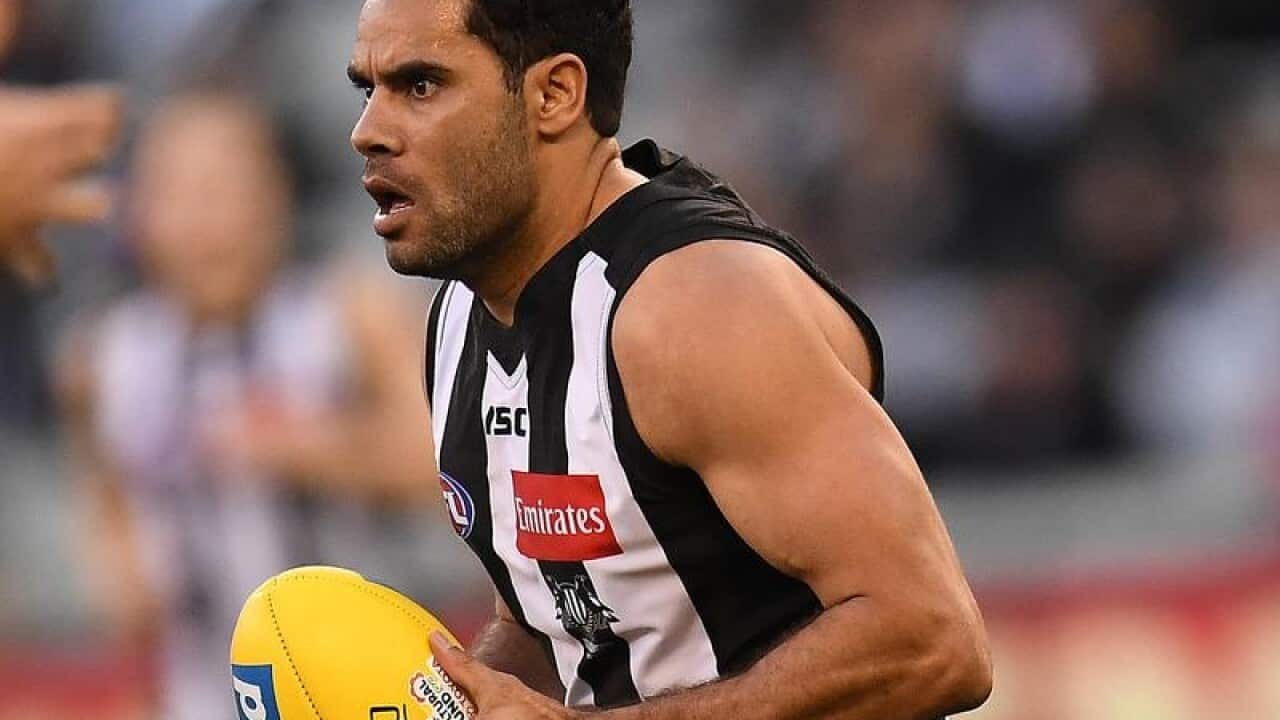 Daniel Wells of the Magpies is seen in action