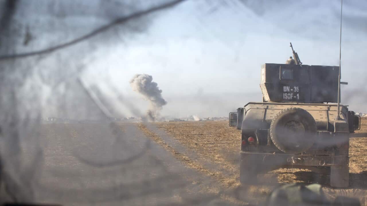Iraqi special forces vehicles on the outskirts of Mosul