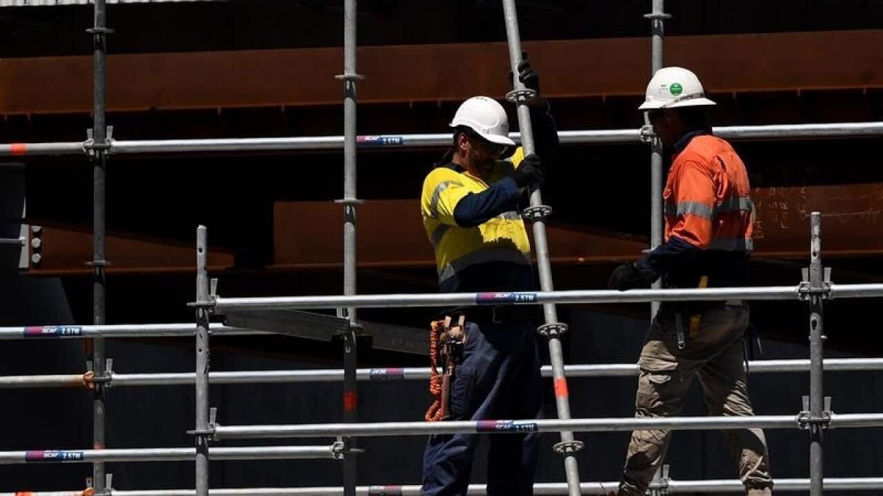 Workers seen at a construction site in central Sydney