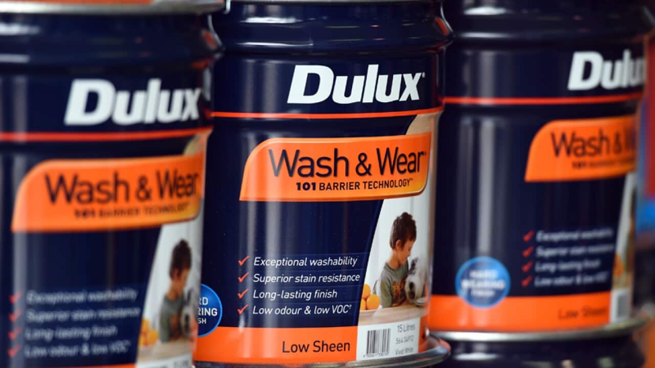 Dulux paint cans at a store