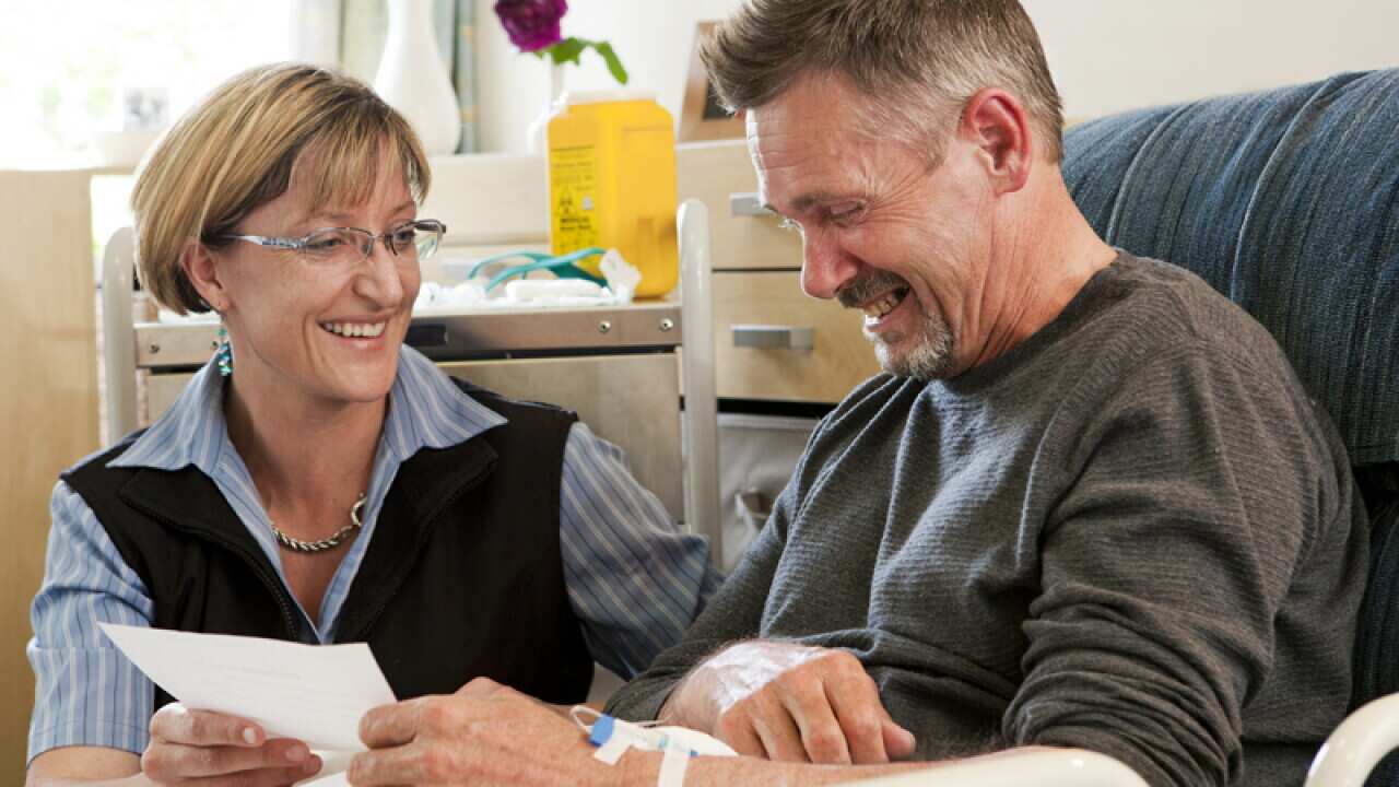 A man gets treated for multiple sclerosis