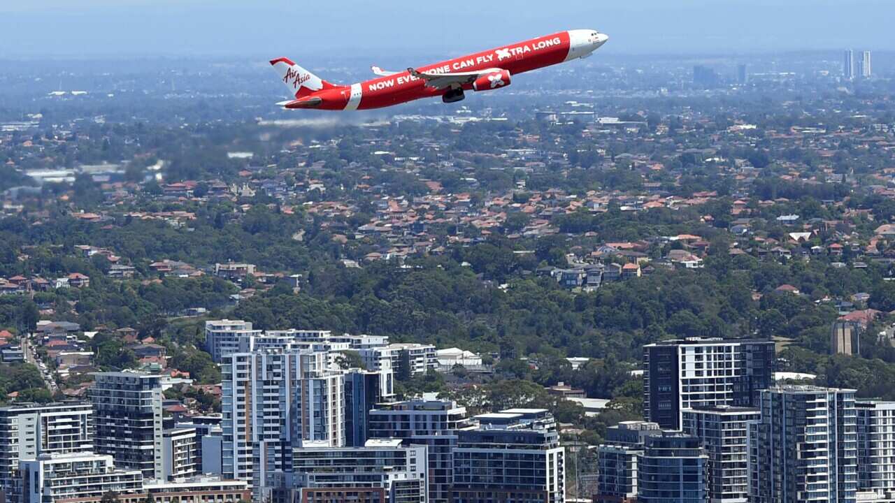 A plan taking off over Sydney Airport.