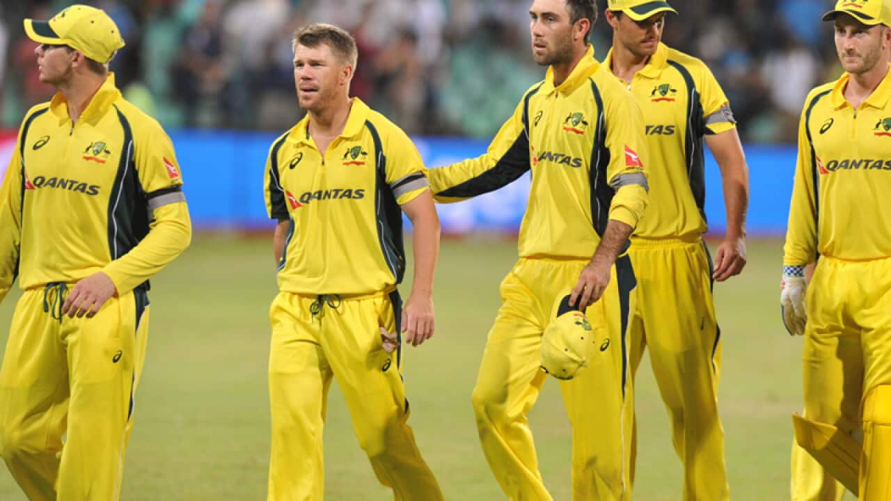 Australia's players leave the field after loosing the match