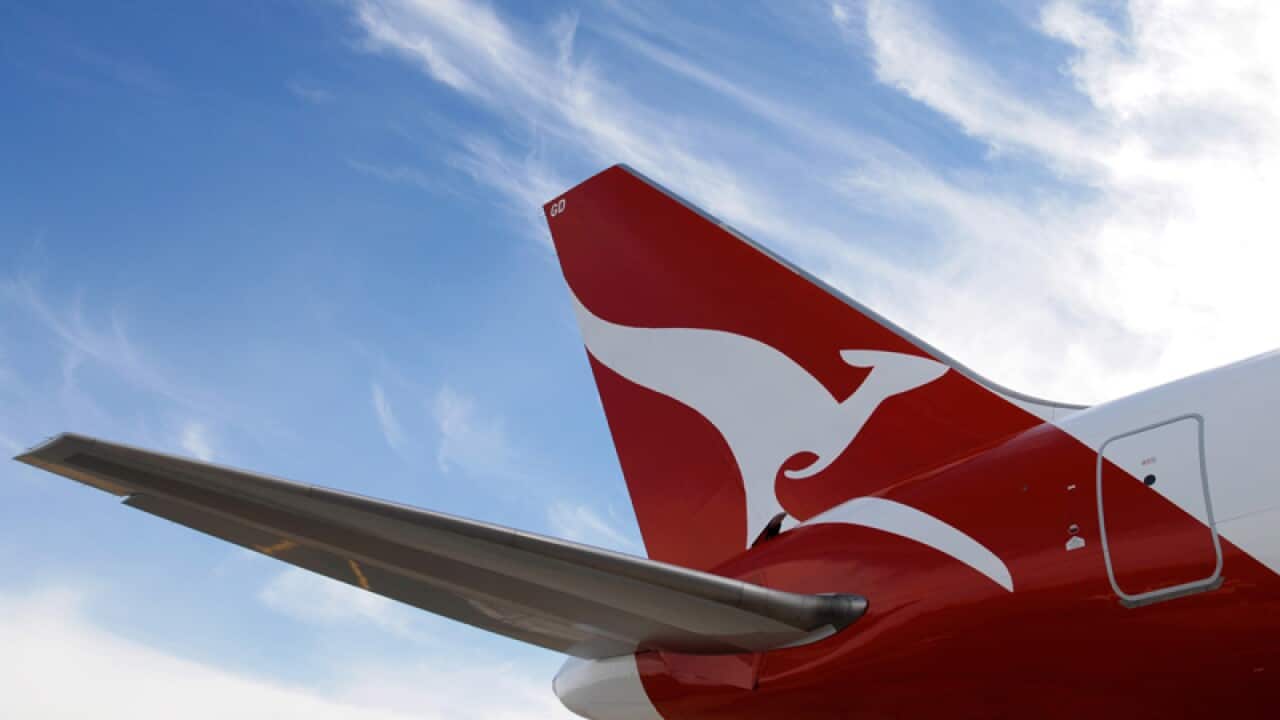 The tail of a Qantas Boeing 767